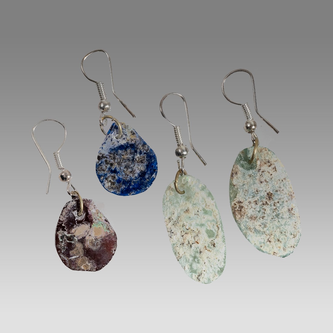 Lot of 2 Ancient Roman Glass Fragment set in silver earrings. (1 of 1)