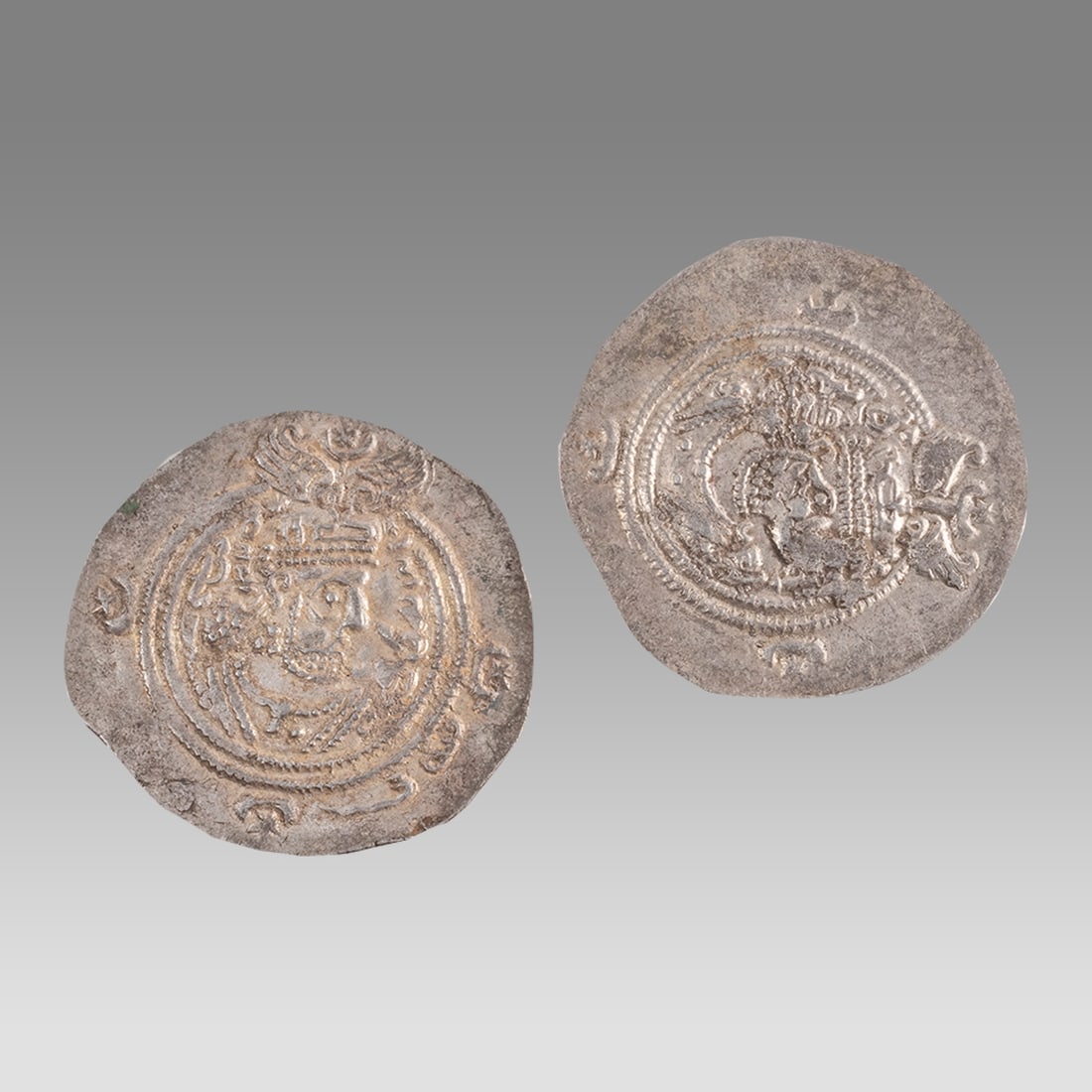 Lot of 2 Sasanian Empire. Khusro II. Silver Drachms 505 AD (2): Lot of 2 Sasanian Empire. Khusro II. Silver Drachms 505 AD (2) Size 32/33 mm. weight 4.10 - 4.15 grams. EF. Crowned and cuirassed bust right / Fire altar flanked by attendants; four crescents around.