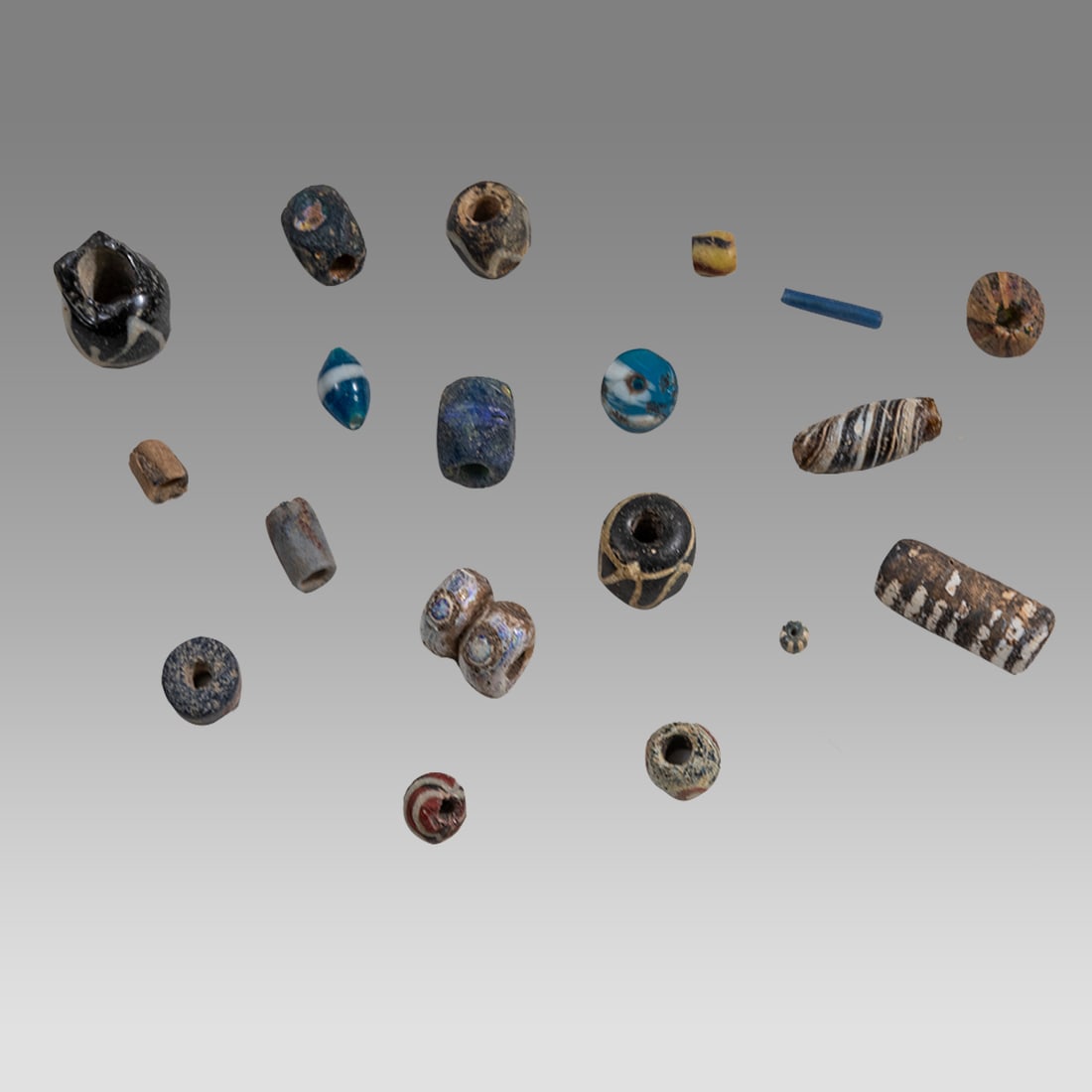 Lot of 18 Ancient Roman Glass Beads c.1st century BC. 2nd century AD. (1 of 1)