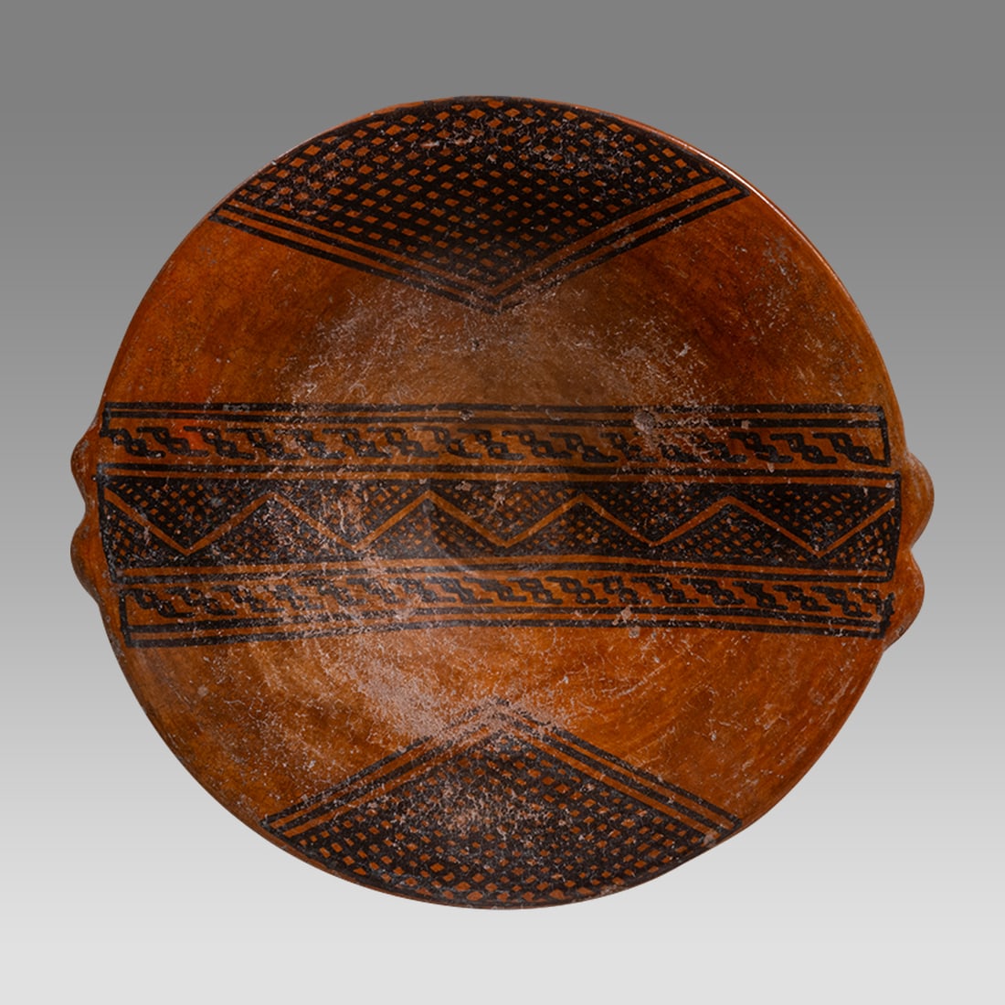 Geomentric Decorated Pottery Plate. (1 of 3)