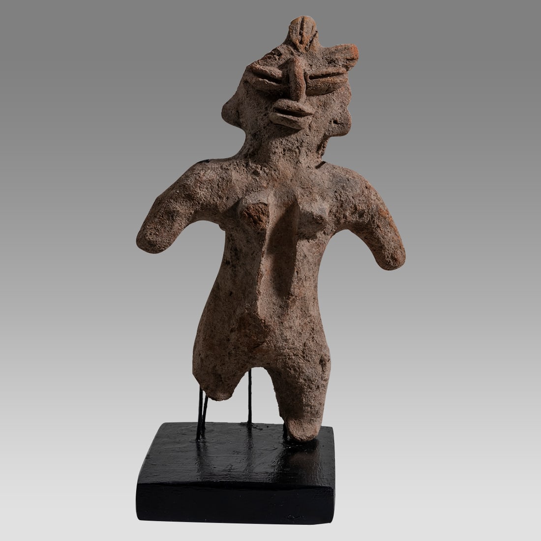 Pre-Columbian Guerrero Female Terracotta Figure (Mezcala culture; ca. 1000 to 400 BCE).: Pre-Columbian Guerrero Female Terracotta Figure (Mezcala culture; ca. 1000 to 400 BCE). Size 9 inches high. + Custom stand included. This type of figure is of an unusual form. Enveloped in grey slip, 