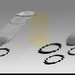 Lot of Ancient Roman Glass Cylindrical Cup & 3 Ancient Roman Glass Bracelets (ca. 1st-3rd century: Lot of Ancient Roman Glass Cylindrical Cup & 3 Ancient Roman Glass Bracelets (ca. 1st-3rd century CE). Size of cup 4 1/4 inches high. Bracalet Size 2 ¼ -1 5/8 inches diameter.. The delicate gre