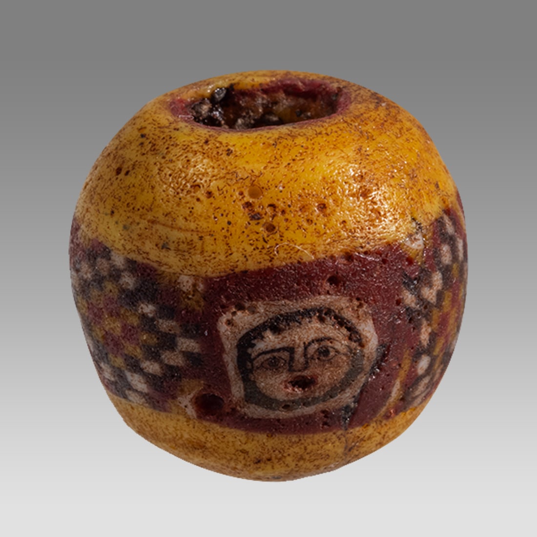 Phoenician Mosaic Face bead Probably 6th century BC. (1 of 2)