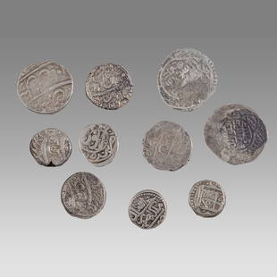 Lot of 10 Islamic India Mughal Silver Coins c.18th century.: Lot of 10 Islamic India Mughal Silver Coins c.18th century. Size 17-30 mm, A collection of 10 thick silver coins with insciptions. Provenance: From a NYC collection acquired in the 1960s