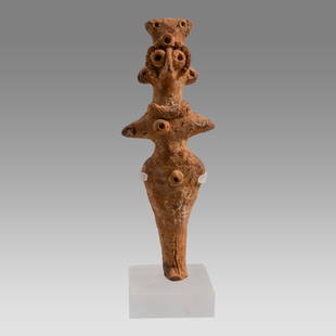 ANCIENT SYRO-HITTITE Ashtar Terracotta IDOL c.2nd millennium B.C.: ANCIENT SYRO-HITTITE Ashtar Terracotta IDOL c.2nd millennium B.C. Size 6 1/2 inches high + stand. Fine molded female Ashtar Idol with bird-like face wearing headdress, both hands spread out, wearing n