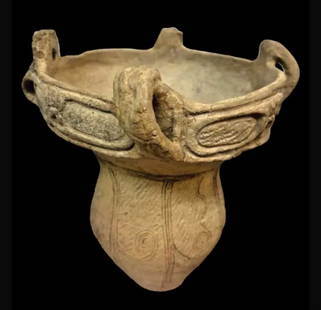 Neolithic Japanese Jomon Pottery Vessel.: Neolithic Japanese Jomon Vessel Probably ca. 3000 BC. Size 12 1/4 inches high x 10 1/2 inches diameter. A large pottery Vase decorated with etched design. condition: Repaired from several pieces with