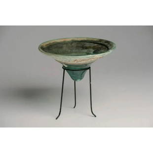 Ancient Byzantine Blue-Green Glass Lamp Ca. 5th-10th century A.D.: Ancient Byzantine Blue-Green Glass Lamp Ca. 5th-10th century A.D. Size 8 1/2 inches diameter. 3 1/2 inches high. Large free blown glass lamp of teal blue hues, conical form, which was most likely orig