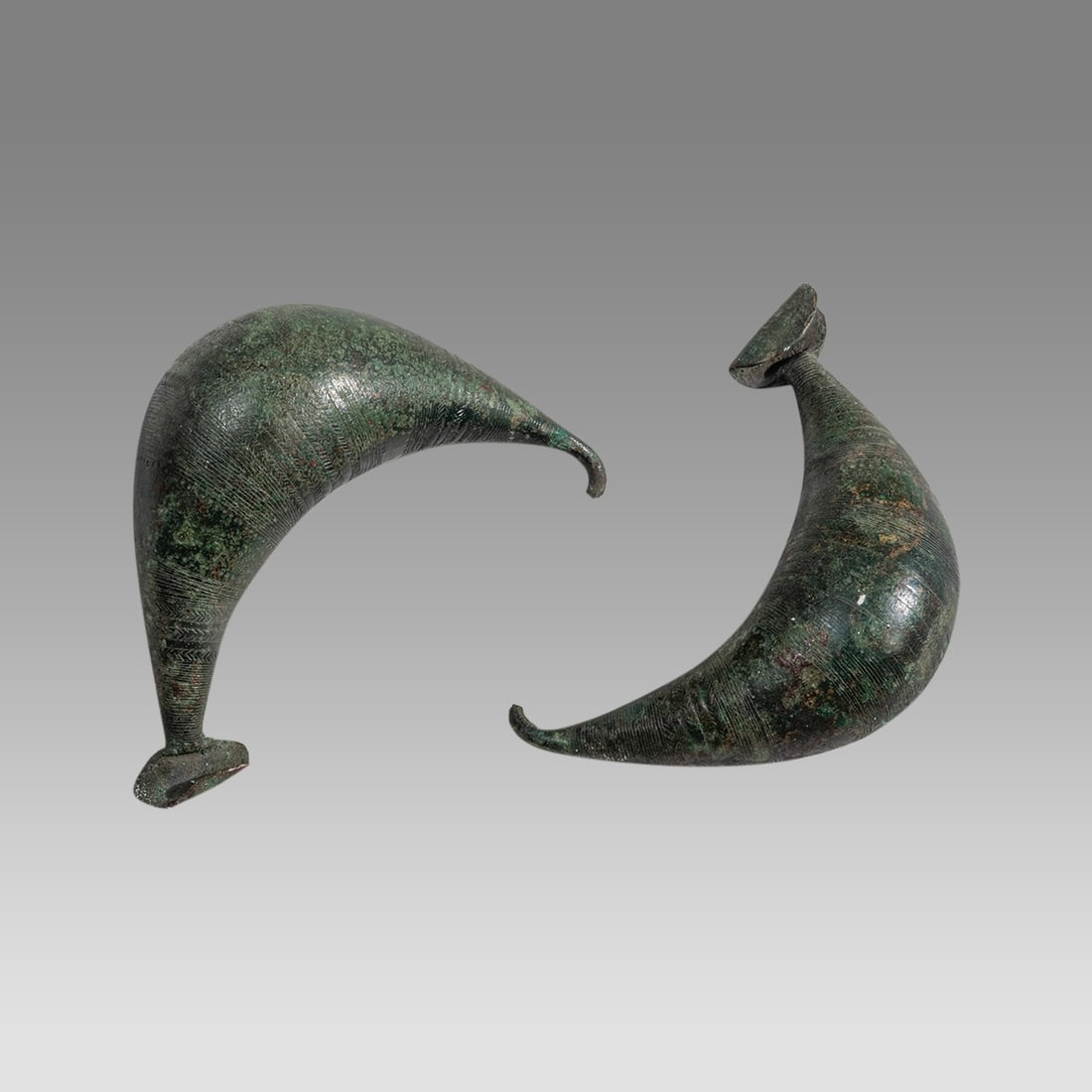 A Pair Of Ancient Italic Bronze Fibulas, c. 7th-6th century BC. (1 of 2)