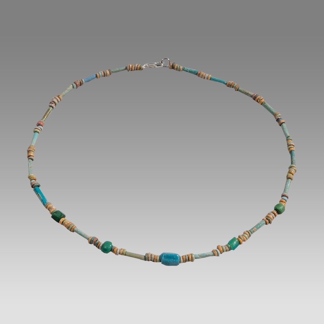 Ancient Egyptian Faience, Bead Necklace c.300-50 BC.: Ancient Egyptian Faience, Bead Necklace c.300-50 BC. Size 18 1/2 inches length. Great Looking single strand Faience Bead necklace with glass beads. wearable. Provenance: Ex Secret Eyes Gallery New Yor