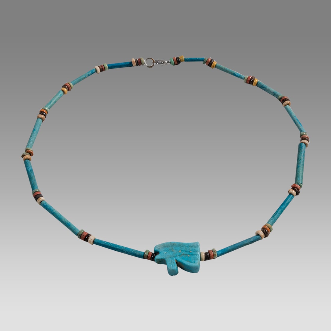 Ancient Egyptian Faience, Bead Necklace c.300-50 BC.: Ancient Egyptian Faience, Bead Necklace c.300-50 BC. Size 18 1/2 inches length. Great Looking single strand Faience Bead necklace with Blue Faience Eye of Horus amulet. wearable. Provenance: Ex Secret