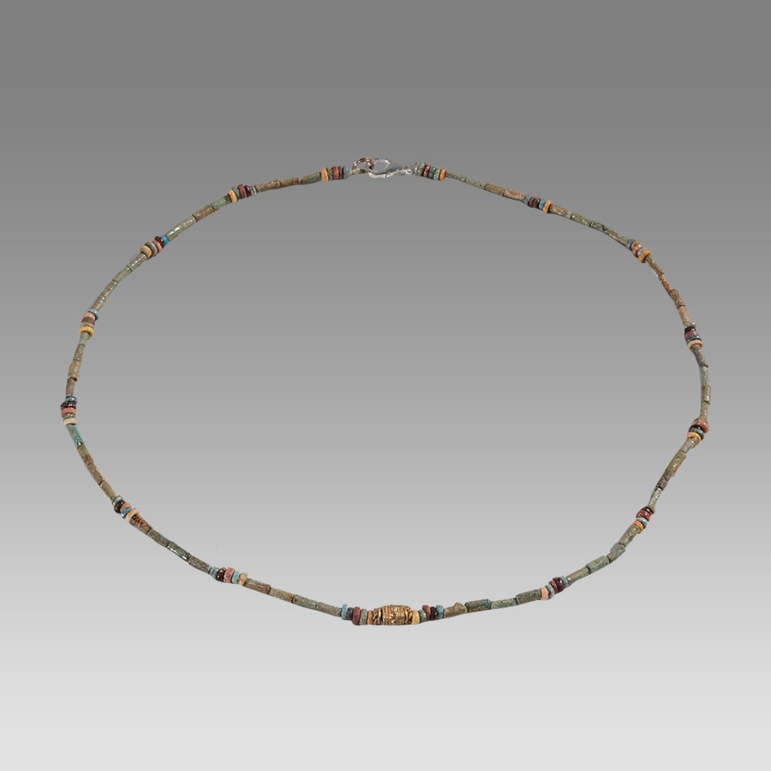 Ancient Egyptian Faience, Bead Necklace c.300-50 BC.: Ancient Egyptian Faience, Bead Necklace c.300-50 BC. Size 18 1/2 inches length. Great Looking single strand Faience Bead necklace with gold bead. wearable. Provenance: Ex Secret Eyes Gallery New York 