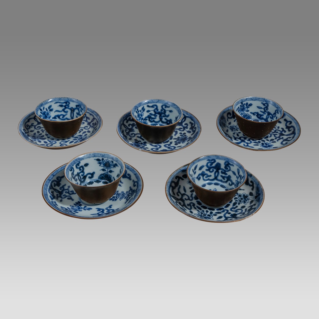 A Set of 5 Chinese Blue and White Cups and Saucers. (1 of 3)