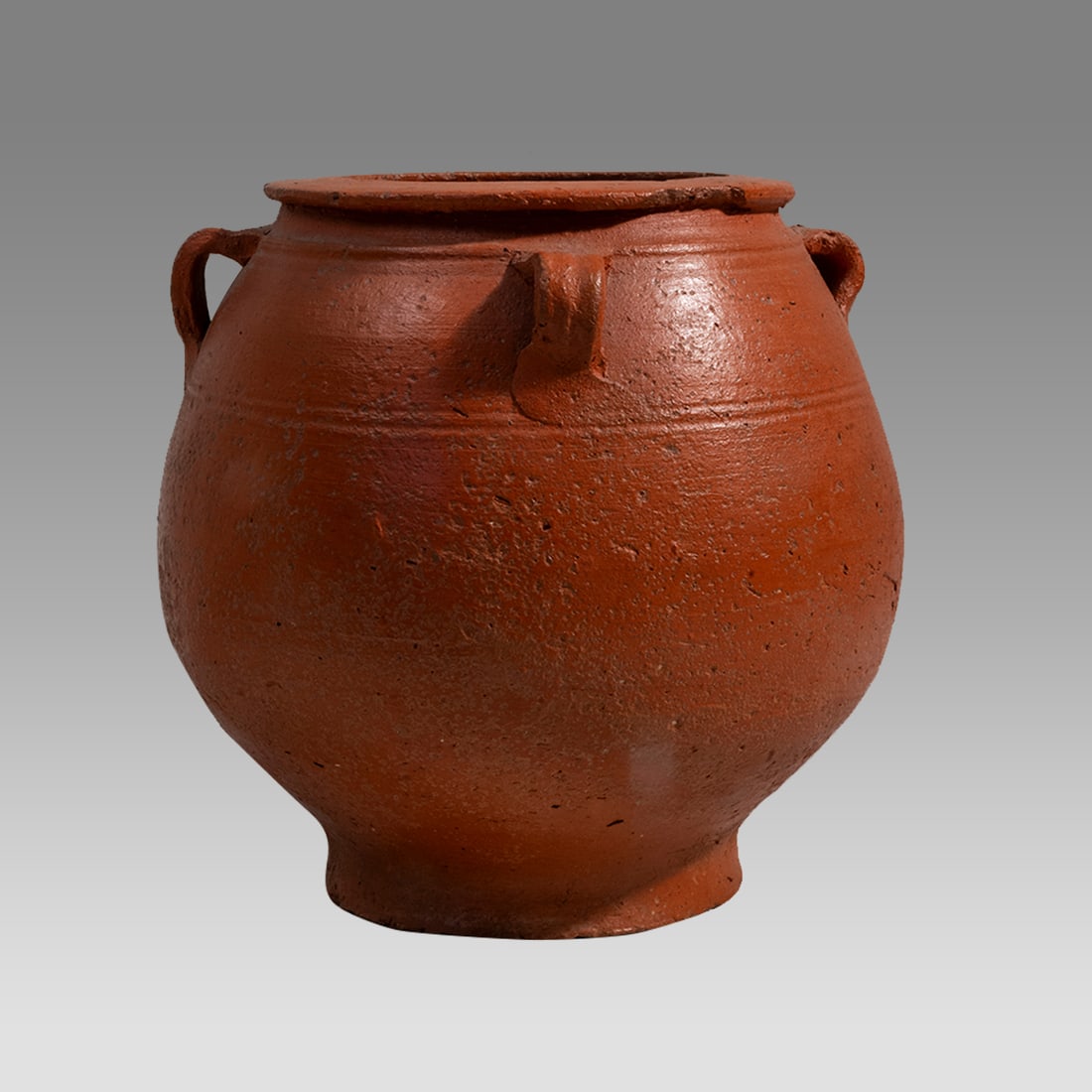 20th century Spain Red Pottery Vessel With four handles.: 20th century Spain Red Pottery Vessel With four handles. Size 6 3/4 inches high, 6 1/4 inches wide. Beautiful Red pottery footed vessel with four loop handles. North African Trade Beads, Mixed Amber L