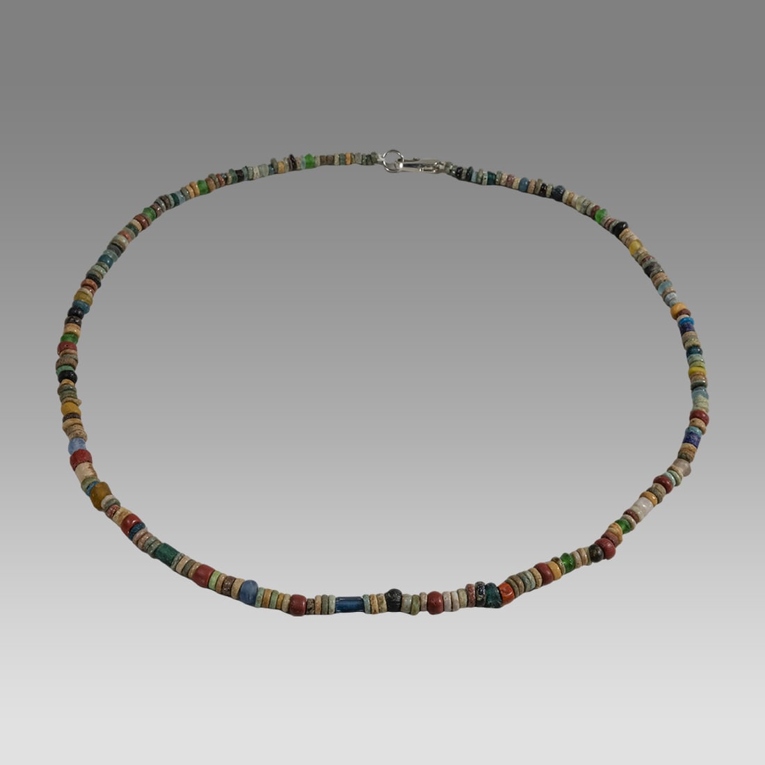 Ancient Egyptian Faience, Bead Necklace c.300-50 BC.: Ancient Egyptian Faience, Bead Necklace c.300-50 BC. Size 19 inches length. Great Looking single strand Faience Bead, mixed with blue glass beads necklace. wearable. Provenance: Ex Secret Eyes Gallery
