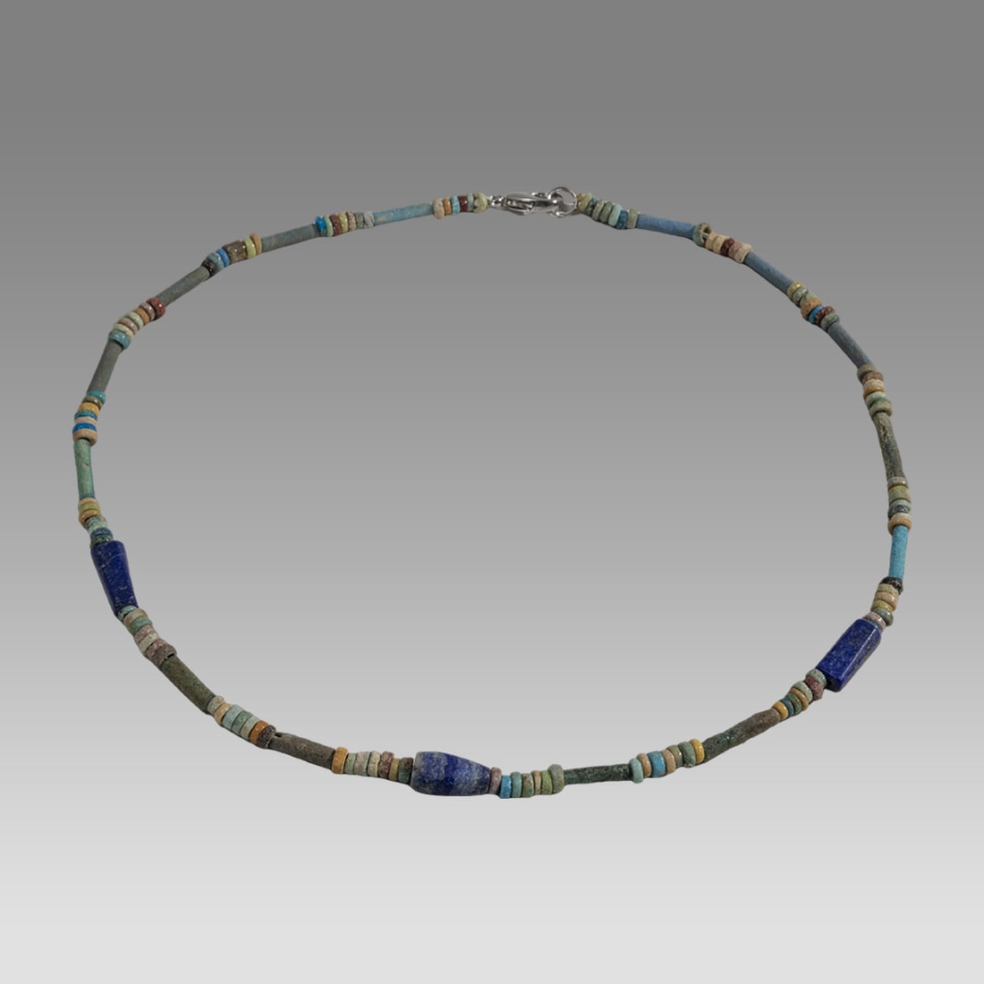 Ancient Egyptian Faience, Bead Necklace c.300-50 BC.: Ancient Egyptian Faience, Bead Necklace c.300-50 BC. Size 17 inches length. Great Looking single strand Faience Bead necklace. With lapis lazuli beads. wearable. Provenance: Ex Secret Eyes Gallery New