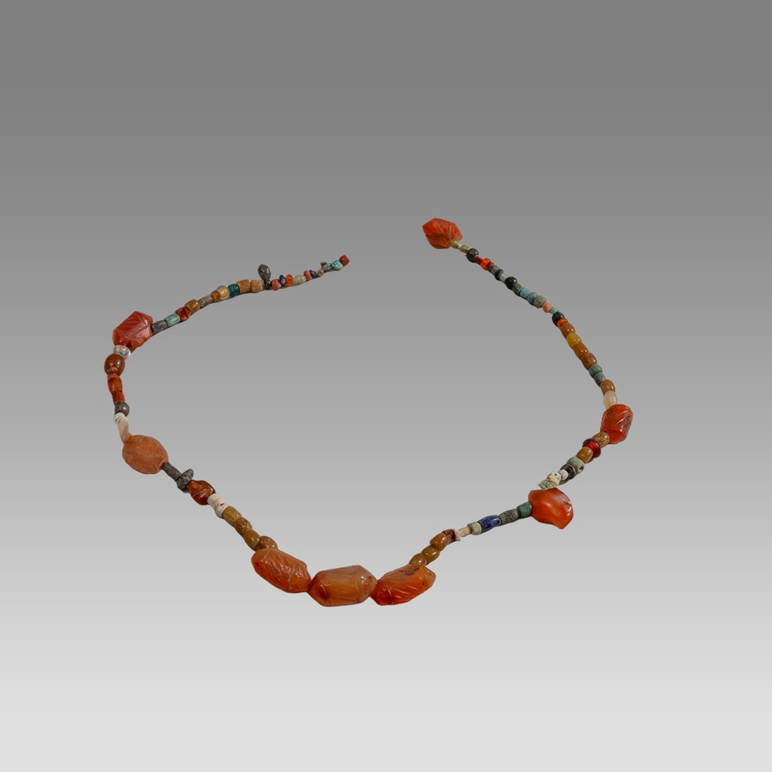 Ancient Roman/Islamic Stone, Glass Beads Necklace c.1st-8th century AD.: Ancient Roman/Islamic Stone, Glass Beads Necklace c.1st-8th century AD. Size 17 inches length. Ancient stone and glass beads from Ancient Roman to Islamic period. Provenance: From a NYC collection acq