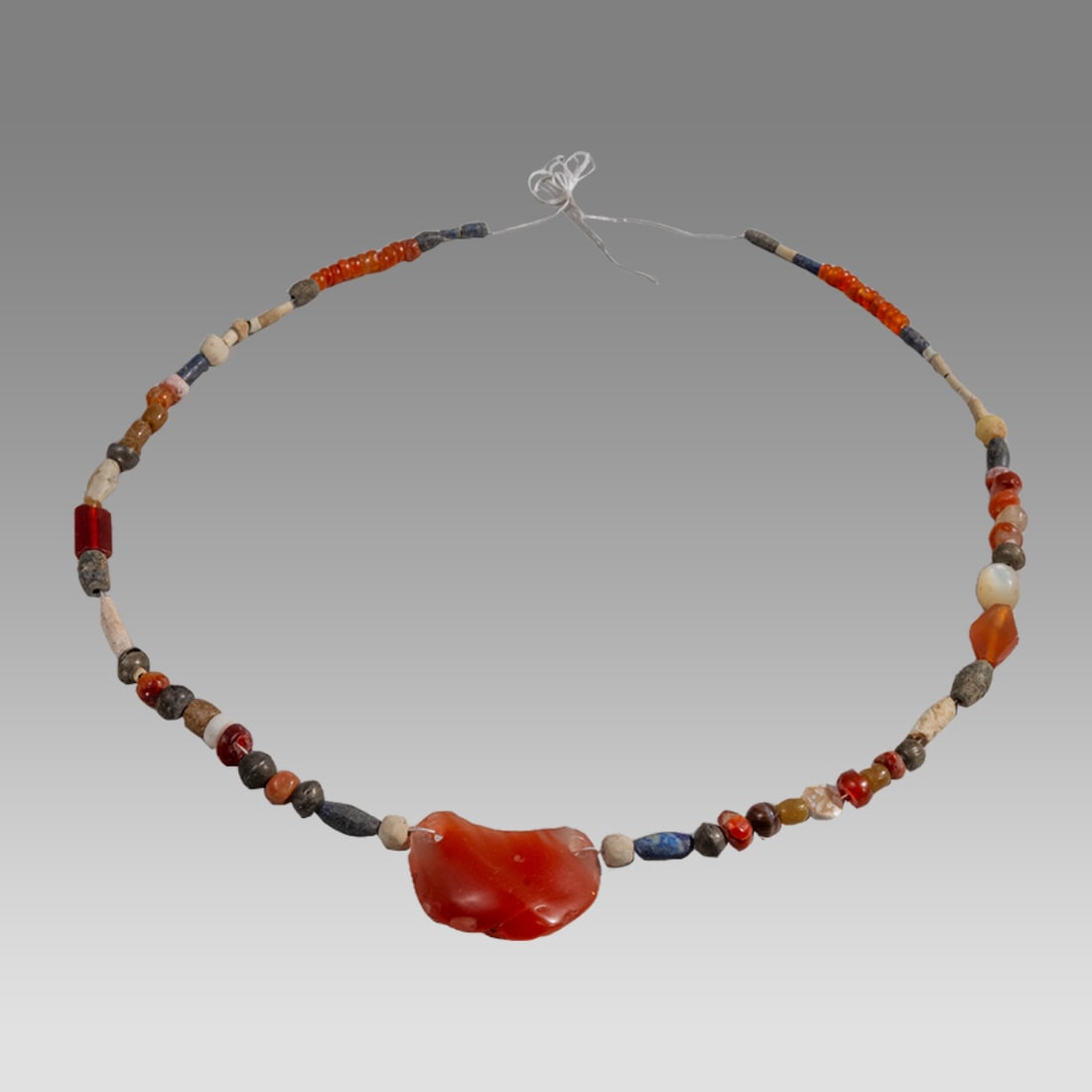 Ancient Roman/Islamic Stone, Glass Beads Necklace c.1st-8th century AD.: Ancient Roman/Islamic Stone, Glass Beads Necklace c.1st-8th century AD. Size 16 inches length. Ancient stone and glass beads from Ancient Roman to Islamic period. Provenance: From a NYC collection acq