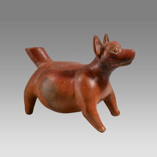 Ancient Pre Columbian Colima Dog c.500 BC-500 AD.: Ancient Pre Columbian Colima Dog c.500 BC-500 AD. Size 12 3/4 inches Length. 9 3/4 inches high. Large hollow red pottery Dog with tail spout. Provenance: Private NYC collection acquired in the USA mar