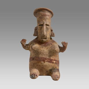 Ancient Pre-Columbian, West Mexico, Jalisco, ca. 300 BC - 300 AD.: Ancient Pre-Columbian, West Mexico, Jalisco, ca. 300 BC - 300 AD. Size 8 1/4 inches high. A seated female figure with both hands raised. Wearing a thick headband. Large earrings is attached to each ea