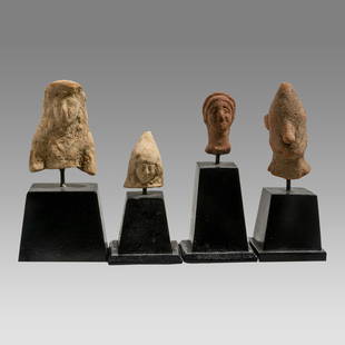 Lot of 4 Ancient Greek Terracotta Heads c.4th-2nd century BC.: Lot of 4 Ancient Greek Terracotta Heads c.4th-2nd century BC. Size 1 1/2 - 2 1/8 inches high + stand. A collection of Greek terracotta heads, fragments from full figures. Provenance: Private NYC colle