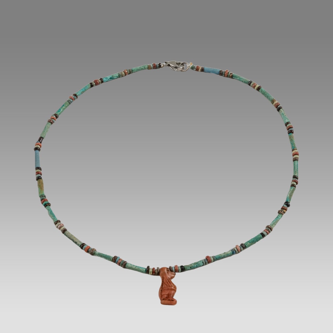 Ancient Egyptian Faience, Bead Necklace c.300-50 BC.: Ancient Egyptian Faience, Bead Necklace c.300-50 BC. Size 17 1/2 inches length. Great Looking single strand Faience Bead necklace with agate Hippo amulet. wearable. Provenance: Ex Secret Eyes Gallery 