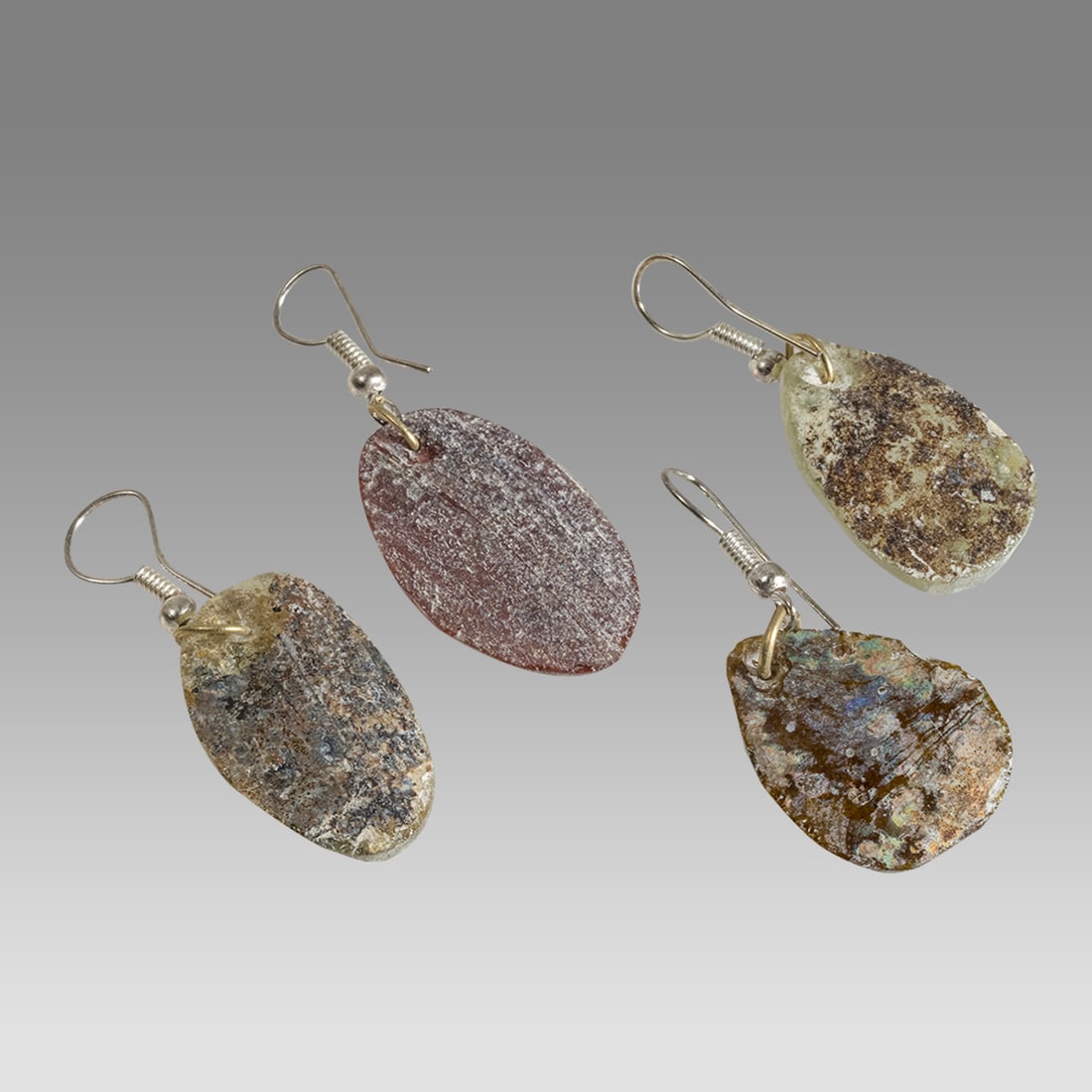 Lot of 2 Ancient Roman Glass Fragment set in silver earrings. (1 of 2)