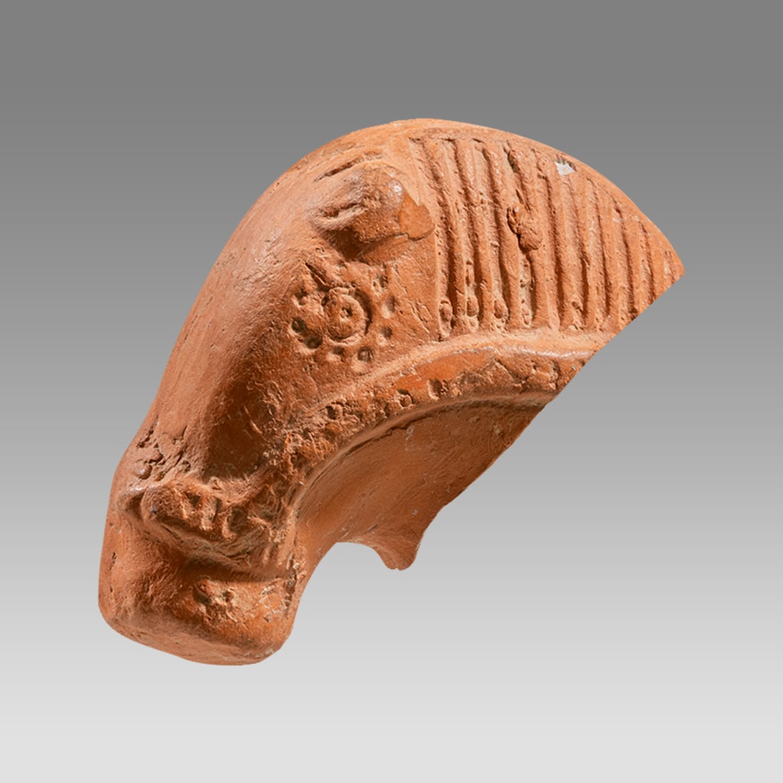 Ancient Roman North Africa Redware Pottery Horse Head c.2nd century AD.: Ancient Roman North Africa Redware Pottery Horse Head c.2nd century AD. Size 2 3/4 inches length. Beautiful redware pottery head of Horse, fragment from full figure. Provenance: from the late Robert H