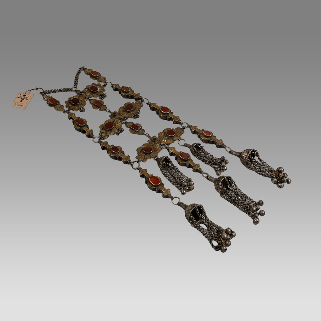 Turkoman braid plait decoration with fire gilding, carnelian and glass stones, and bells. (1 of 2)