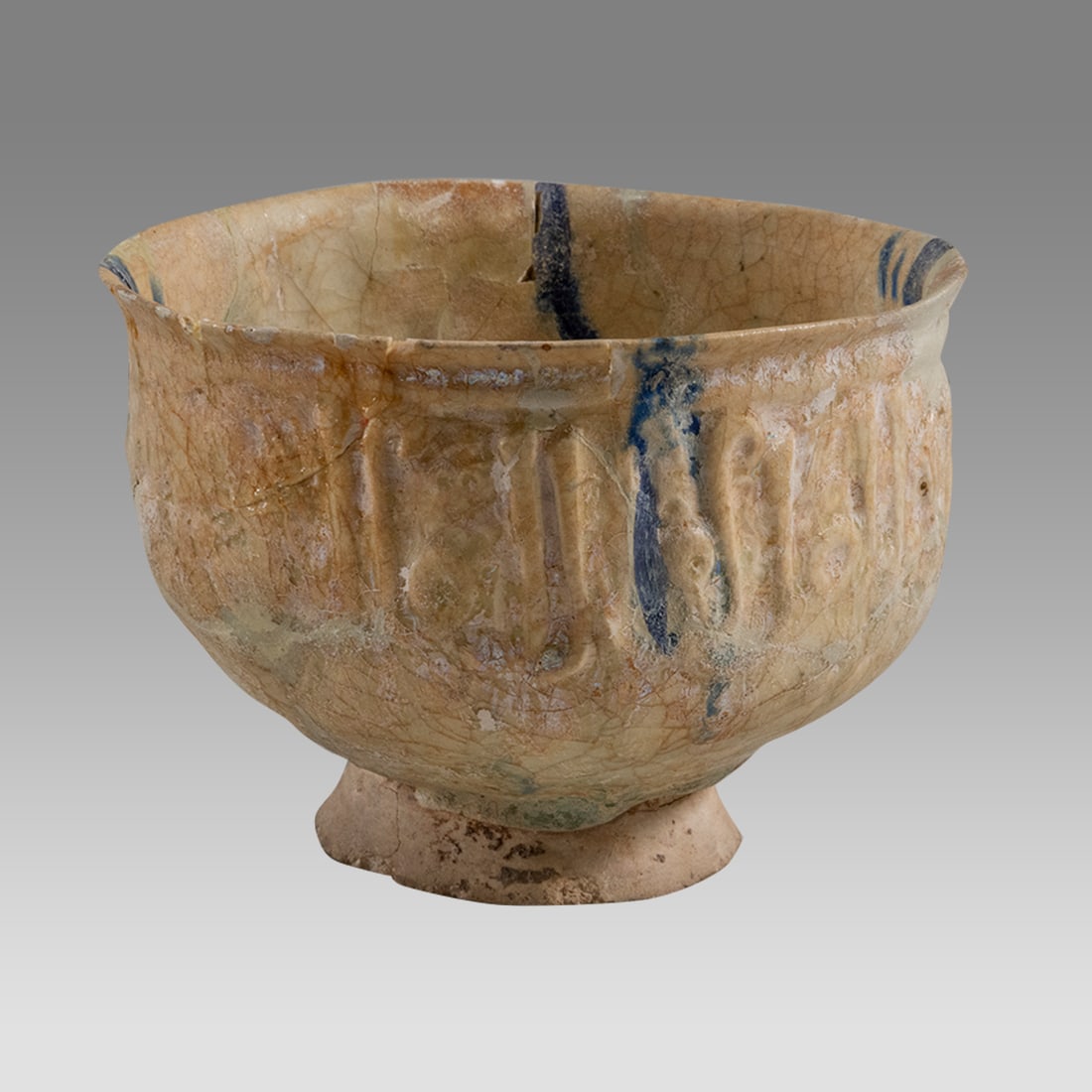 Islamic Persian Kashan Ceramic Bowl With Inscription c.13th century AD.: Islamic Persian Kashan Ceramic Bowl With Inscription c.13th century AD. Size 5 1/8 inches diameter. 3 7/8 inches high. Rare Ceramic footed bowl with relief Arabic inscriptions. Provenance: From a NYC 