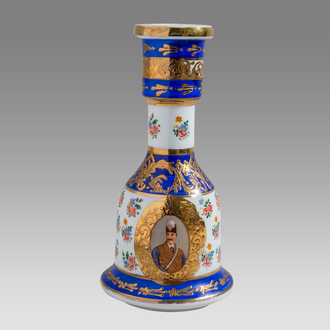 20th century Persian Porcelain Hookah Bottle with Two Shah Portrait.: 20th century Persian Porcelain Hookah Bottle with Two Shah Portrait. Size 11 inches high. Fine Porcelain hookah bottle with two portrait of Shah, floral design between.