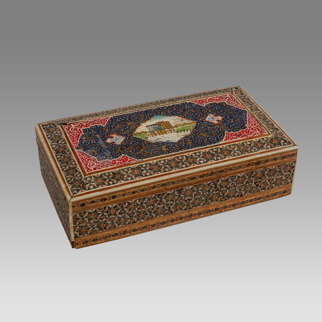Vintage Persian Khatam Inlaid Box.: Vintage Persian Khatam Inlaid Box. Size 6 1/2 inches length, 3 1/4/4 inches wide. Decorated with a palace in the center with ornate design