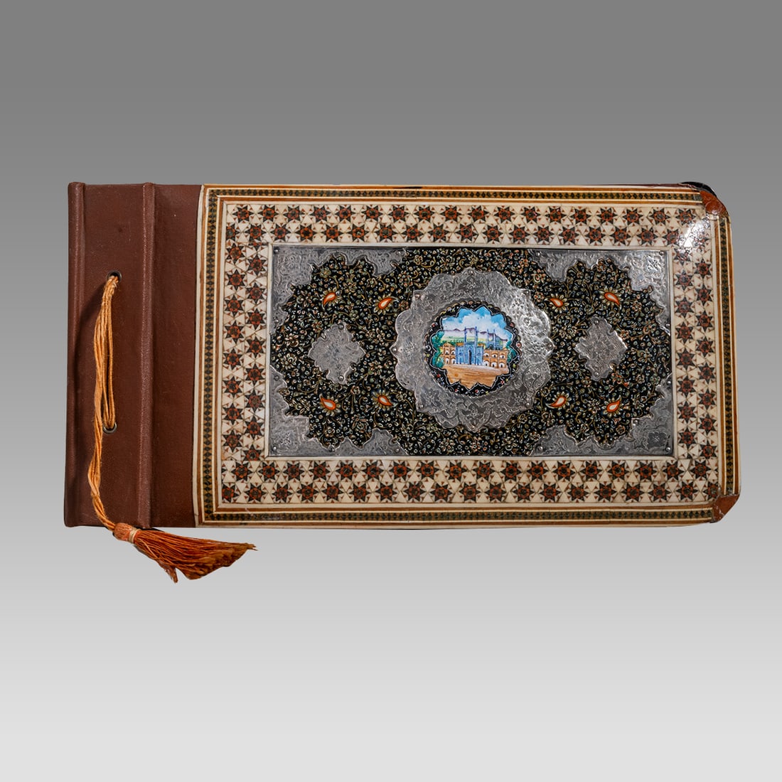 Vintage Persian Khatam Inlaid Album With Silver Mounts.: Vintage Persian Khatam Inlaid Album With Silver Mounts. Size 12 3/4 inches length, 6 3/4 inches wide. Fine Album cover with khatam inlay over leather with silver and enamel mounts. Inside plain pages