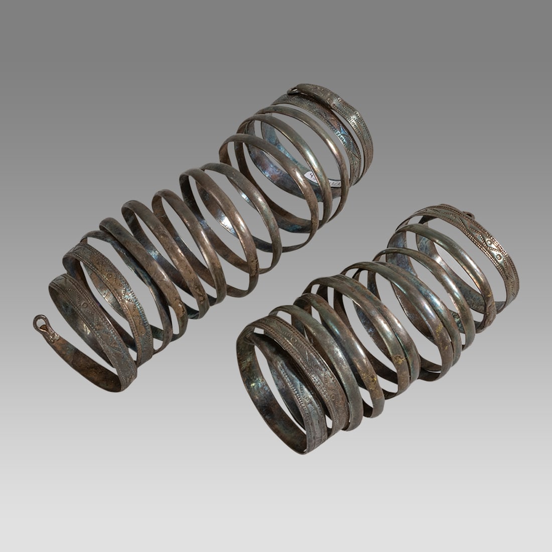 A Pair of Islamic Silver Spiral Snake Bracelets c.18th century or Earlier. (1 of 2)