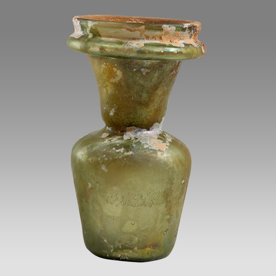Ancient Roman Glass Bottle c.2nd-3rd century AD.: Ancient Roman Glass Bottle c.2nd-3rd century AD. Size 4 3/4 high, 2 5/8 inches diameter. Fine Roman glass bottle with wide rim. Beautiful iridescent patina. Provenance: Private east coast collection,