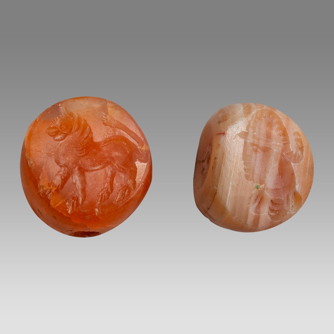Lot of 2 Sasanian Agate Stamp Seals c.5th-6th century AD.: Lot of 2 Sasanian Agate Stamp Seals c.5th-6th century AD. Size 15-16 mm. Fine carved agate stone stamp seals with animal. Suspension hole. Provenance: Ex Secret Eyes Gallery New York 1970's-1980's.