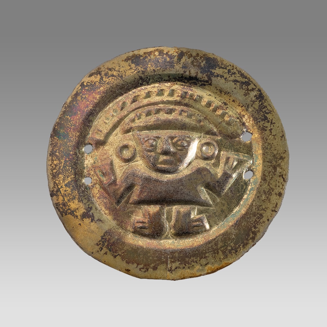 Chimu Gold Repousse Ornament Featuring a Diety (ca 100-700 CE). (1 of 2)