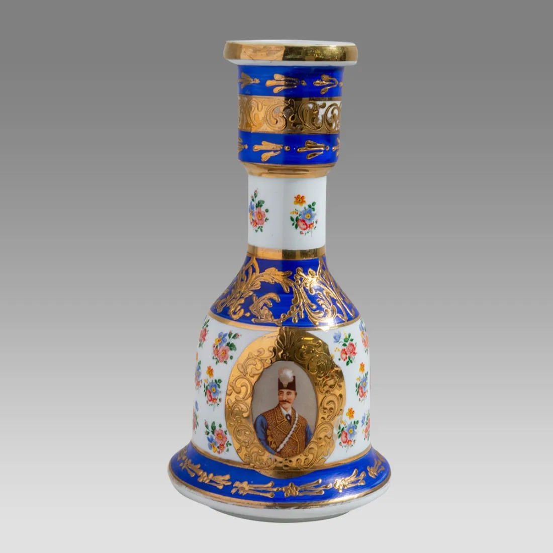 20th century Persian Porcelain Hookah Bottle with Two Shah Portrait.: 20th century Persian Porcelain Hookah Bottle with Two Shah Portrait. Size 11 inches high. Fine Porcelain hookah bottle with two portrait of Shah, floral design between.