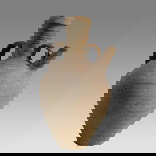 Ancient Holy Land Islamic Pottery Water Jug c.1200 AD.: Ancient Holy Land Islamic Pottery Water Jug c.1200 AD. Size 13 inches high. A large pottery jug with loop type strap handle and spout at shoulder, with ring base. Provenance: From The estate of Rev.