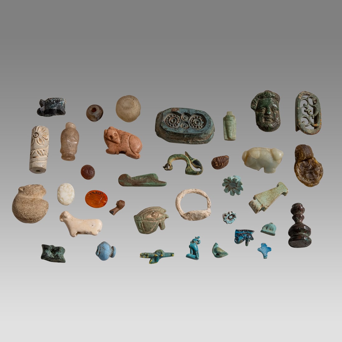 A collection of 35 Ancient Egyptian, Near Eastern, Roman Amulets c.3000 BC to 600 AD. (1 of 1)