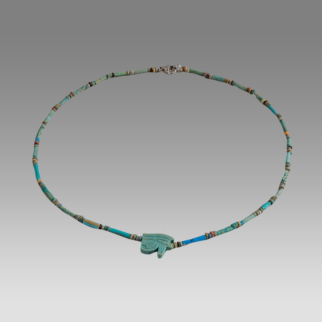 Ancient Egyptian Faience, Bead Necklace c.300-50 BC.: Ancient Egyptian Faience, Bead Necklace c.300-50 BC. Size 18 1/4 inches length. Great Looking single strand Faience Bead necklace with eye of horus amulet. wearable. Provenance: Ex Secret Eyes Gallery