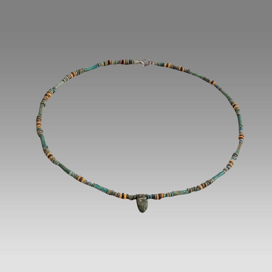 Ancient Egyptian Faience, bead Necklace c.300-50 BC.: Ancient Egyptian Faience, bead Necklace c.300-50 BC. Size 17 3/4 inches length. Great Looking single strand Faience Bead necklace with Heart amulet. wearable. Provenance: Ex Secret Eyes Gallery New Yo