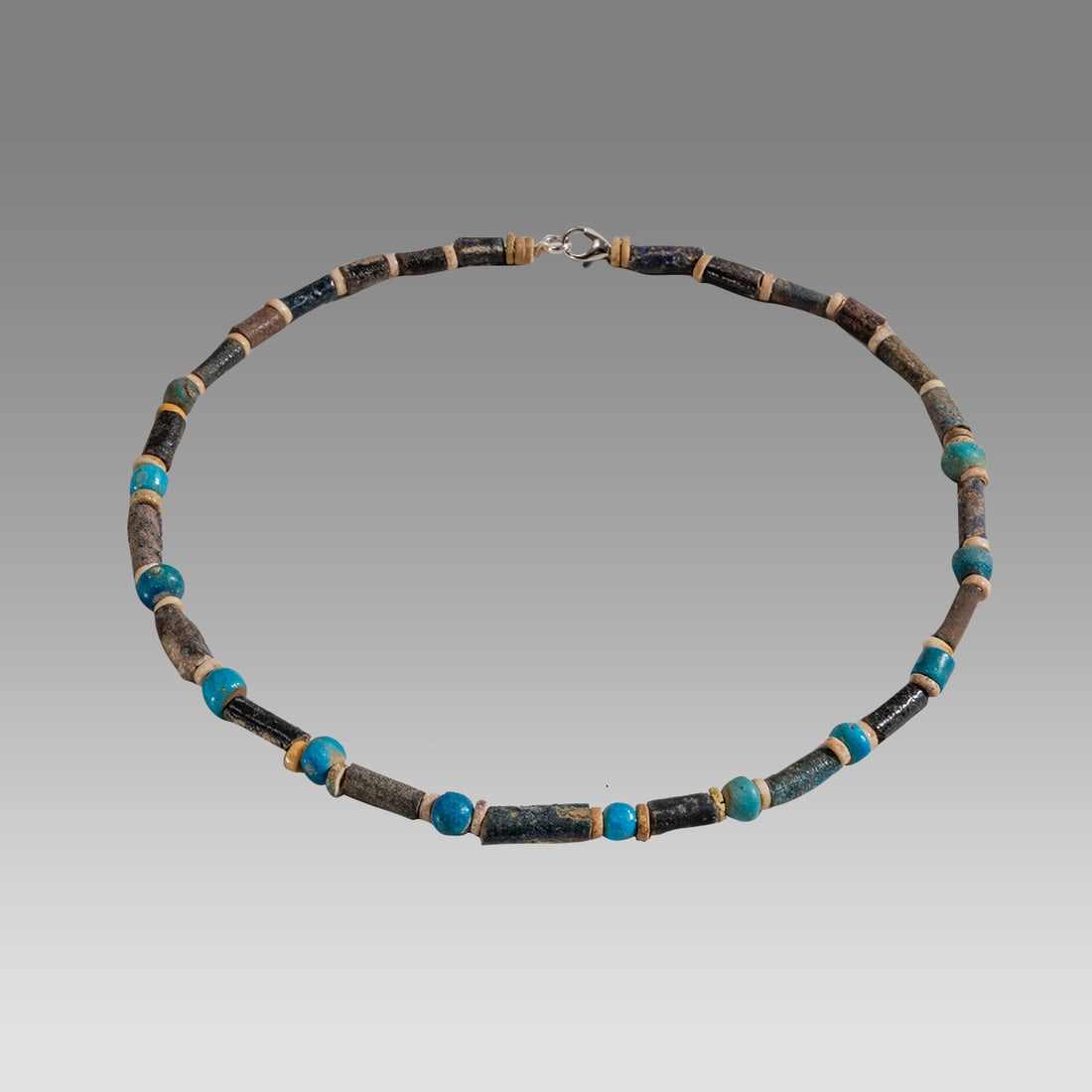 Ancient Egyptian Faience, bead Necklace c.300-50 BC.: Ancient Egyptian Faience, bead Necklace c.300-50 BC. Size 16 1/2 inches length. Great Looking single strand Faience Bead necklace. wearable. Provenance: Ex Secret Eyes Gallery New York 1970's-1980's