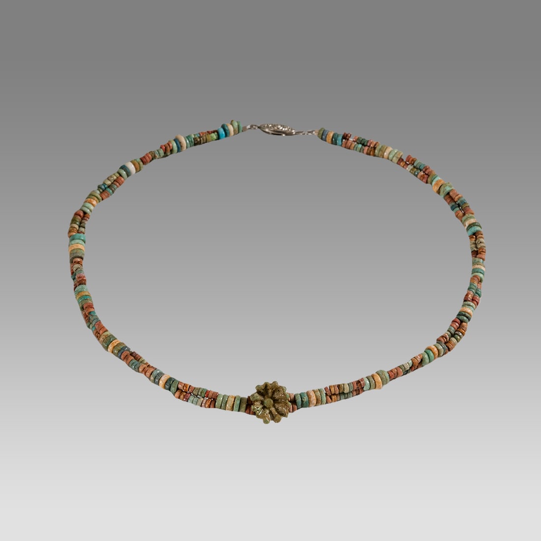 Ancient Egyptian Faience, bead Necklace c.300-50 BC.: Ancient Egyptian Faience, bead Necklace c.300-50 BC. Size 16 inches length. Great Looking single strand Faience Bead necklace with Lotus amulet. wearable. Provenance: Ex Secret Eyes Gallery New York 1