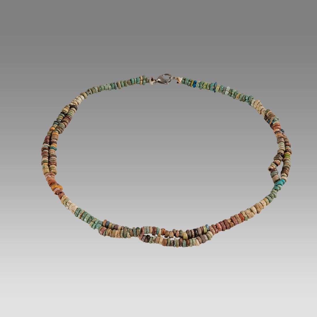 Ancient Egyptian Faience, bead Necklace c.300-50 BC.: Ancient Egyptian Faience, bead Necklace c.300-50 BC. Size 16 inches length. Great Looking double strand Faience Bead necklace. wearable. Provenance: Ex Secret Eyes Gallery New York 1970's-1980's