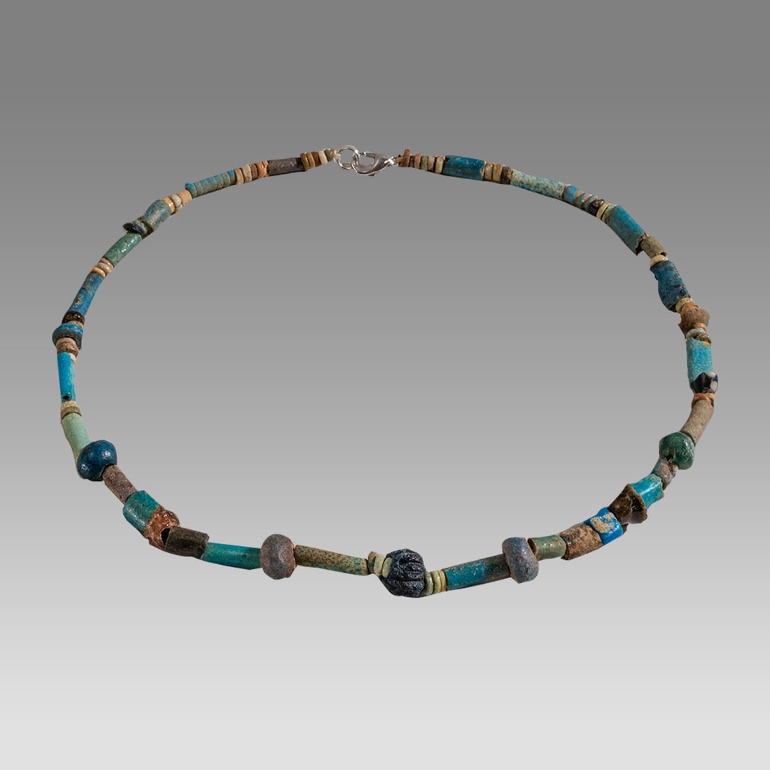 Ancient Egyptian Faience, bead Necklace c.300-50 BC.: Ancient Egyptian Faience, bead Necklace c.300-50 BC. Size 16 1/4 inches length. Great Looking single strand Faience Bead necklace mixed with glass beads. wearable. Provenance: Ex Secret Eyes Gallery N