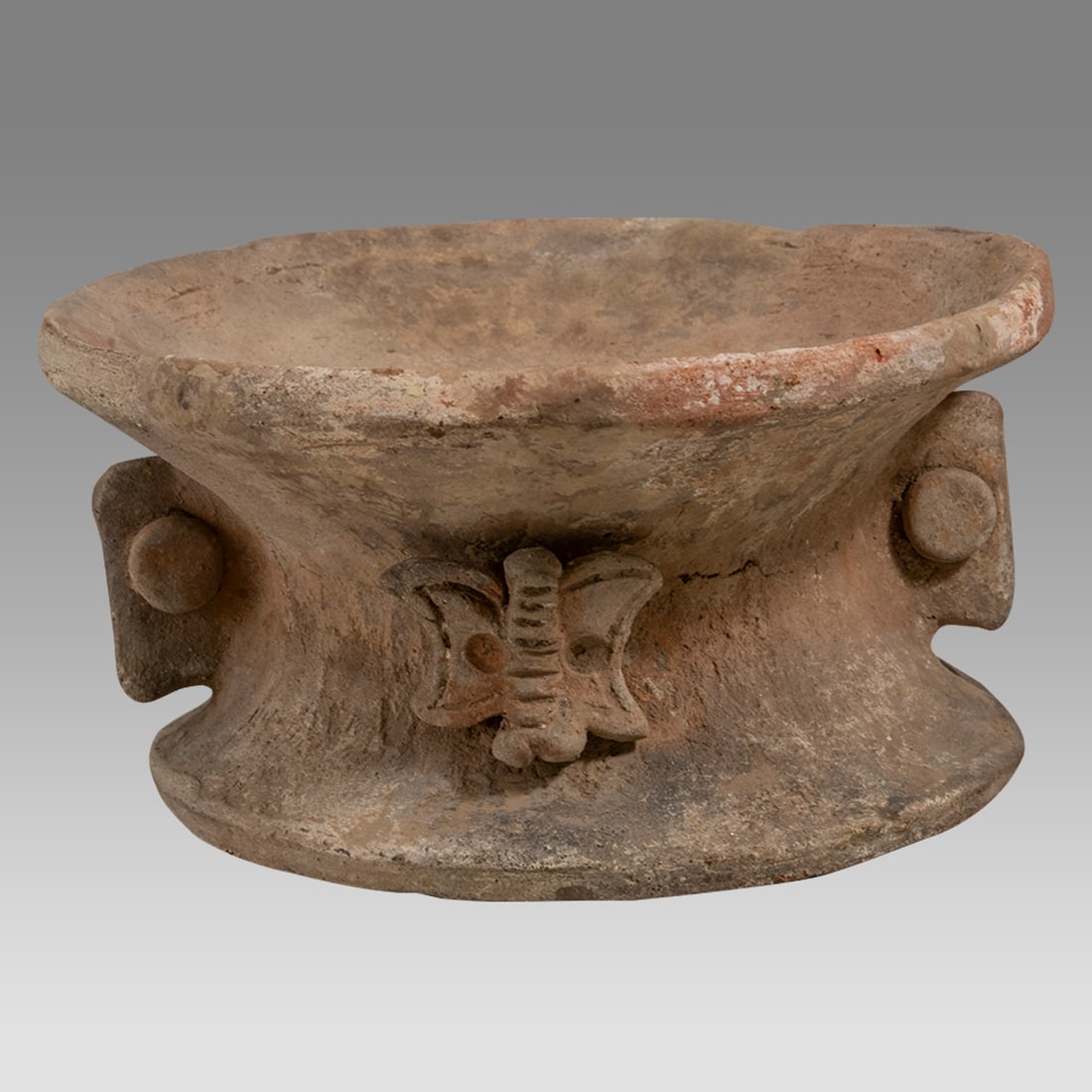 Teotihuacan Incensario Lid, possibly ancient 600-1000 A.D?. Maya regions.: Teotihuacan Incensario Lid, possibly ancient 600-1000 A.D?. Maya regions. Size 7 inches diameter. 3 3/4 inches high. Heavily repaired with lots of restoration. Basically a pastiche. Ex. Stendahl Galle