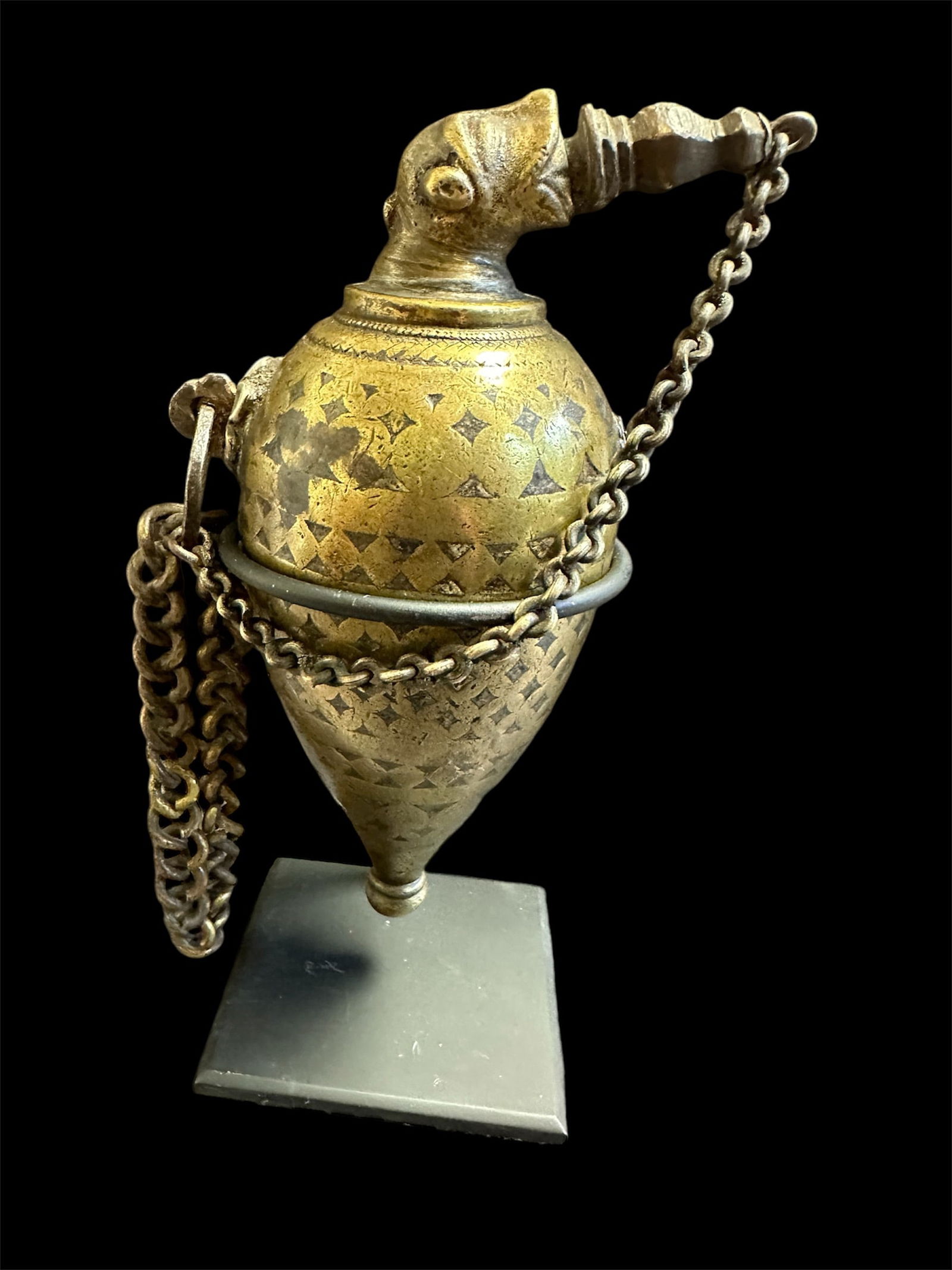 18th century Indian, Mughal Bronze Gun Powder Flask: 18th century Indian, Mughal Bronze Gun Powder Flask. Size 6 1/2 inches high. + stand. Fine cast bronze gun powder flask with lion finial, original chain. Custom mounted.