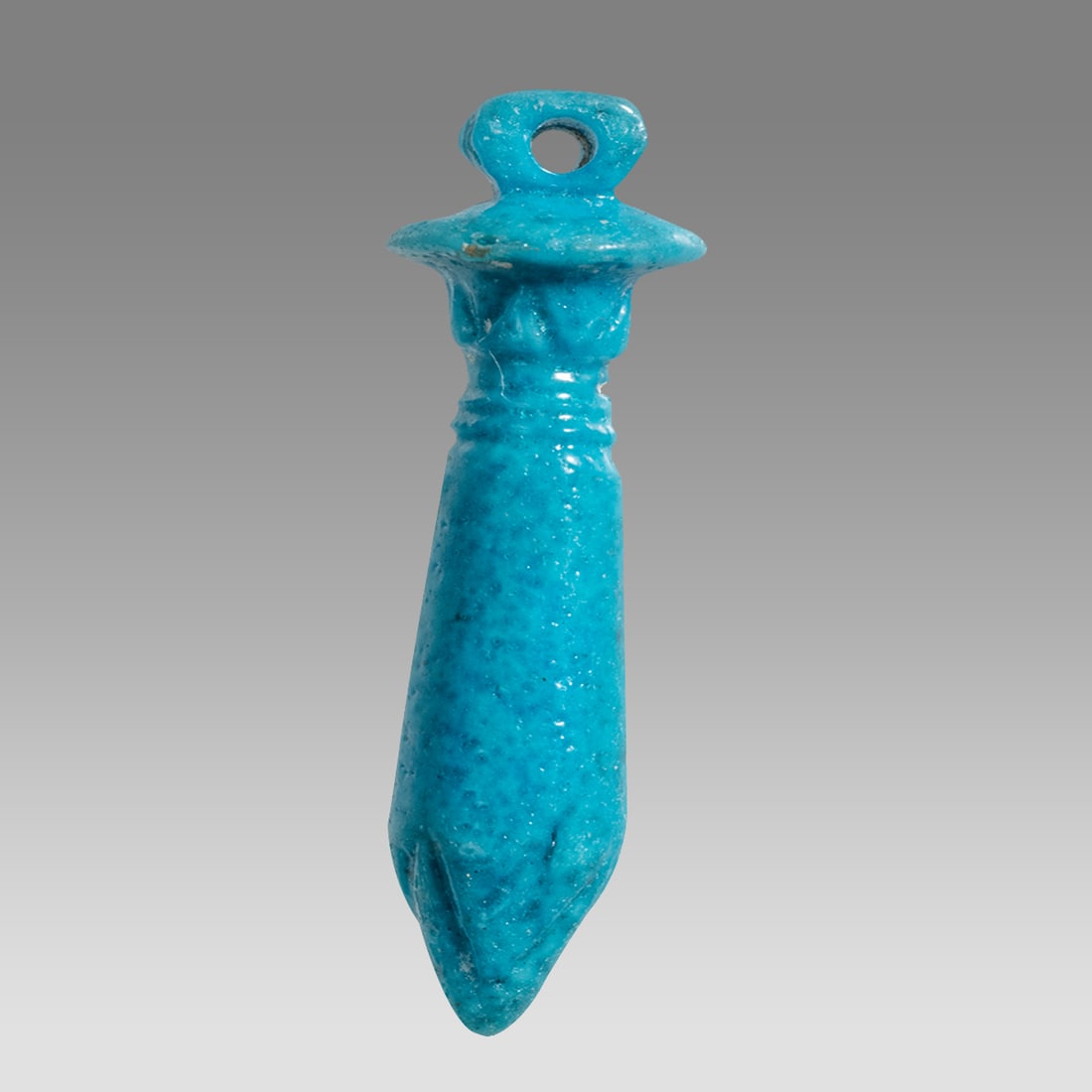 Ancient Egyptian Faience Papyrus Amulet c.663-525 BC.: Ancient Egyptian Faience Papyrus Amulet c.663-525 BC. Size 26 mm. Fine blue faience, papyrus amulet. Suspension at top. Provenance: Ex Secret Eyes Gallery New York 1970's-1980's
