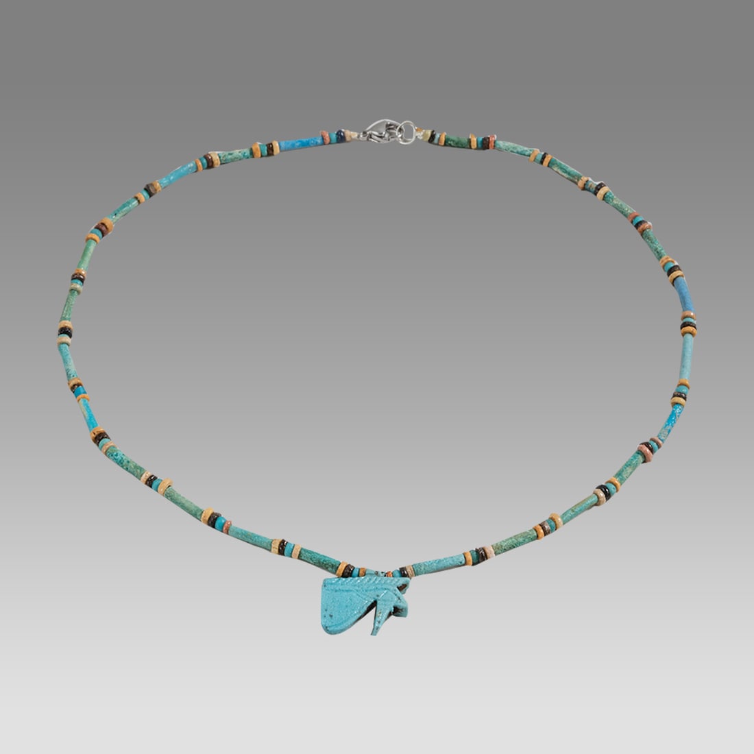 Ancient Egyptian Faience, Necklace c.300-50 BC.: Ancient Egyptian Faience, Necklace c.300-50 BC. Size 18 1/4 inches length. Great Looking single strand Faience Bead necklace with Eye of Horus amulet. wearable. Provenance: Ex Secret Eyes Gallery New 