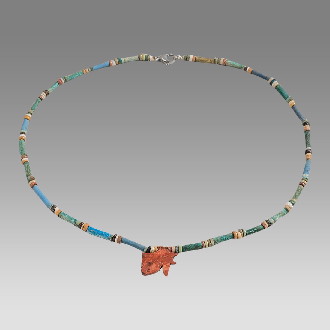 Ancient Egyptian Faience, Necklace c.300-50 BC.: Ancient Egyptian Faience, Necklace c.300-50 BC. Size 18 inches length. Great Looking single strand Faience Bead necklace with Eye of Horus amulet. wearable. Provenance: Ex Secret Eyes Gallery New York